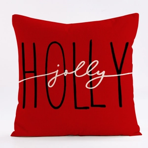 Red linen Christmas cushion cover with Holly Jolly print on white background