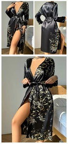 Detail of floral satin robe with silk texture, side slits and matching waist belt