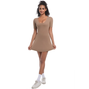 Front view of brown slim-fit tennis dress bodysuit with deep U-neck and A-line skirt