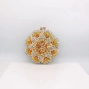 Detailed macro view of radial flower petal pattern with yellow and white rhinestones