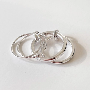 Minimalist 925 sterling silver multi-layered stacked ring set with polished finish