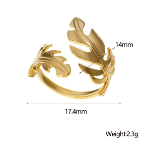 Detail shot of golden leaf-shaped ring with textured veins and 14mm width dimensions