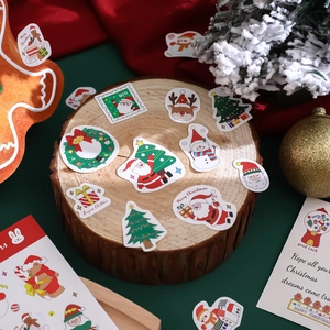 Cartoon Christmas sticker set with Santa Claus and Reindeer for holiday scrapbooking