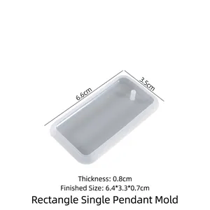 Translucent rectangular silicone mold for DIY pendant crafting with dimensions 6.6x3.5cm