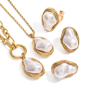 Baroque gold jewelry set with irregular pearls including necklace, bracelet and ring