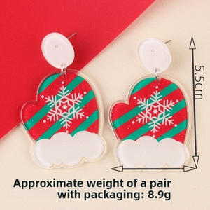 Detailed size view of Christmas glove earrings with festive snowflake patterns