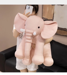 Close-up of pink elephant plush toy with soft breathable fabric texture for kids