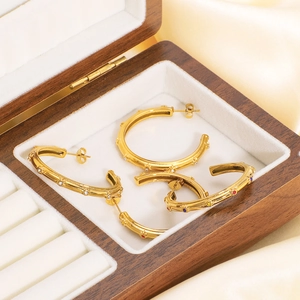 18K gold plated C-shaped hoop earrings with colorful zircon stones in a wooden box