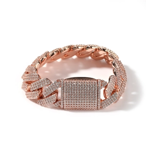 Detailed close-up of 20mm rose gold Cuban link chain with shimmering pavé zircons