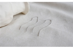 Minimalist S925 sterling silver wavy threader earrings on a soft fabric surface
