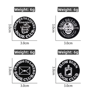 Set of four black and white enamel pins showing dimensions of 3.0cm and 6g weight