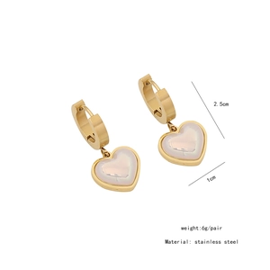 Detail view of gold stainless steel heart earrings with pearl inlay and size dimensions