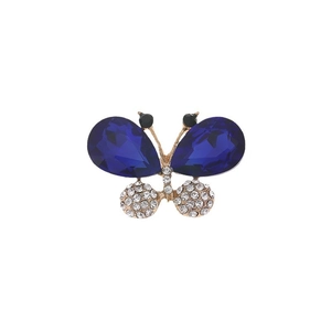 Golden butterfly accessory with blue gemstone wings and sparkling crystals for DIY crafts