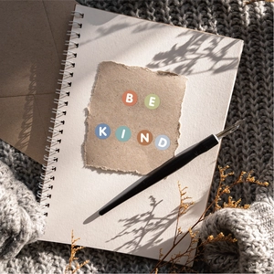 Aesthetic close-up of 0.5 inch waterproof colorful letter stickers on a notebook