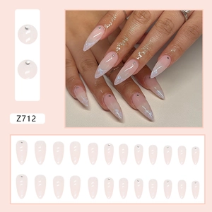 Pink gradient press-on nails with French glitter and rhinestones, almond shape set