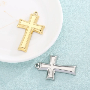 Polished stainless steel cross pendants in gold and silver finishes for DIY jewelry