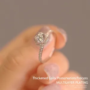 Sparkling diamond rose flower ring with multilayer plating in a silver metal finish