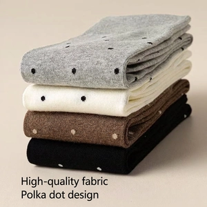 Four pack of vintage polka dot cotton socks in grey, beige, brown, and black colors