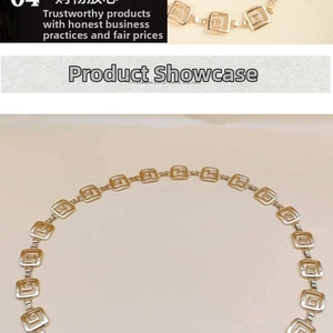 Detailed macro view of golden metal square chain links with geometric greek key pattern