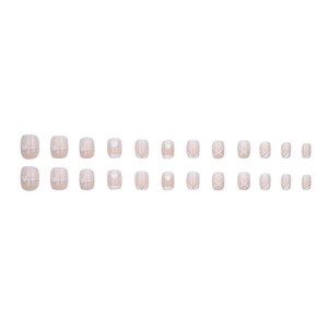 Short round press-on nails with pink base, white hearts and French cross line designs