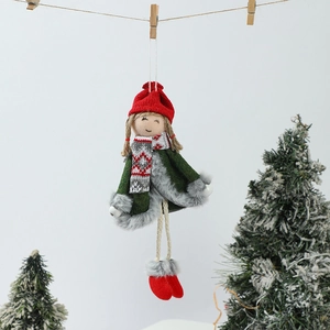 Detail of Christmas angel girl doll with red knitted hat and long legs hanging on rope