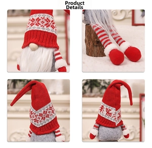 Detail view of a Christmas gnome with snowflake knit hat and striped long legs