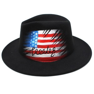 Black fedora wool hat with a torn American flag print and stylized handwritten typography