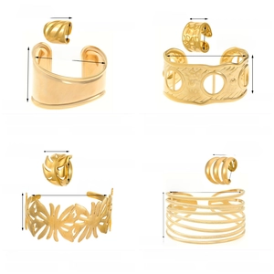 Detailed size chart for four gold stainless steel jewelry sets with precise measurements