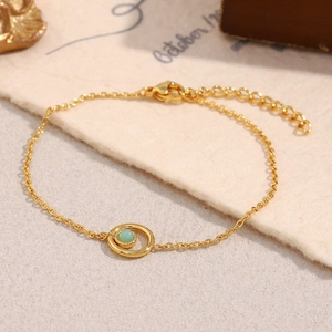 Minimalist 18K gold plated stainless steel chain bracelet with a green natural stone charm