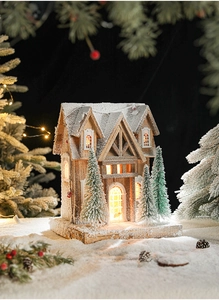 Detail of a lighted wooden Christmas cabin with warm LED lights and realistic snow textures