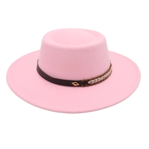 Detailed close-up of pink felt boater hat featuring a woven band and metallic buckle