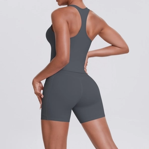 Close-up of racerback sports bra and high-waisted shorts in charcoal grey