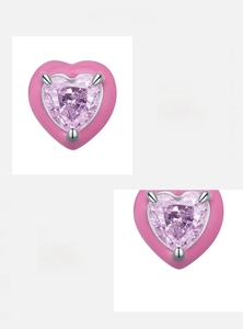Detail of 925 sterling silver heart stud earring with pink zircon and enamel finish