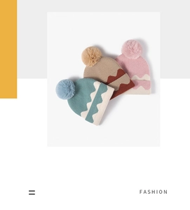 Detailed trio of knitted hats featuring colorful pom-poms and wavy textured weave patterns