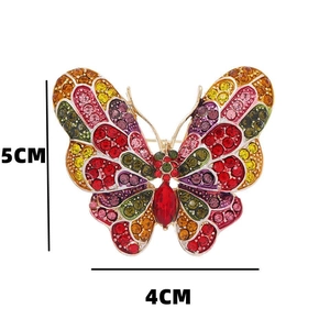 Detailed view of colorful butterfly brooch with rhinestones showing 5cm x 4cm dimensions