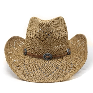 Hollow straw cowboy hat with vintage silver metal ornaments and leather band decoration