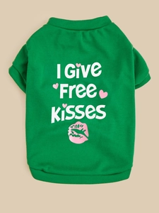Close-up of green pet vest with I Give Free Kisses print and soft cotton texture