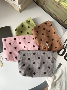 Corduroy polka dot cosmetic bags in green pink brown and gray with zipper closure