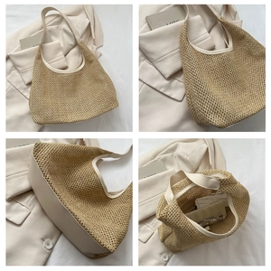 Detail view of woven straw tote bag with PU leather trim and spacious interior