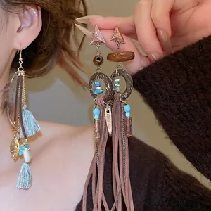 Bohemian tassel earrings with turquoise, wood rings and long velvet fringe for women