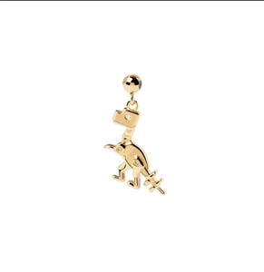 Detailed close-up of golden dinosaur skeleton charm with polished metallic finish