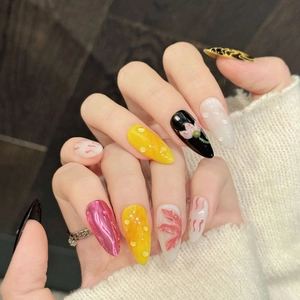 Handmade press-on nails with 3D floral accents, leopard print, and metallic mirror finish
