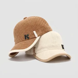 Children's corduroy baseball caps with letter R badge in caramel and cream colors