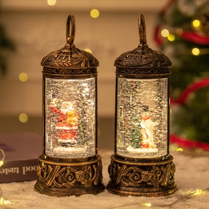 Vintage bronze Christmas lantern with Santa and snowman scenes featuring LED snow globe effect