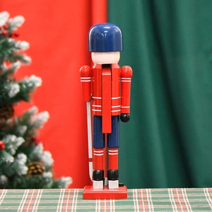 Ice hockey nutcracker wooden ornament in red and blue uniform for Christmas decor
