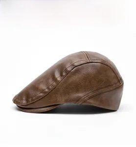 Detail view of the side profile on a brown faux leather vintage newsboy cap with stitching