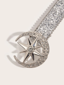 Sparkling silver belt for women featuring a crescent moon and star buckle with rhinestones