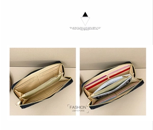 Macro view of long zipper purse showing internal card slots and banknote compartments