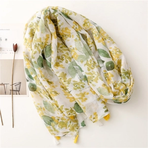 Breathable cotton linen scarf with bright yellow floral leaf print and fringe tassels