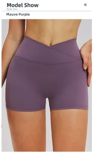 Detail of cross high waist yoga shorts in mauve purple with tummy control effect